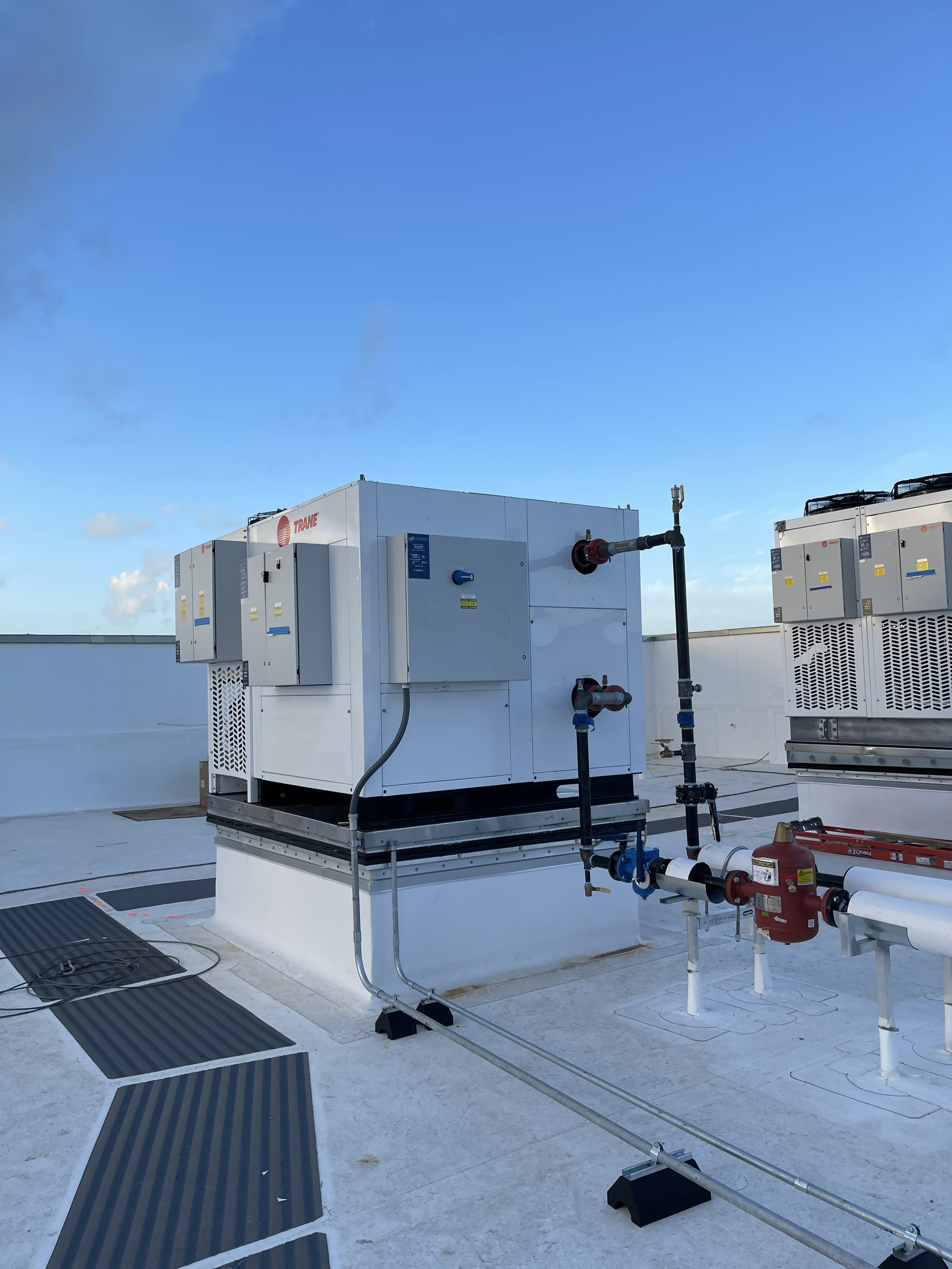 Rooftop condenser units and electrical disconnects at a medical facility