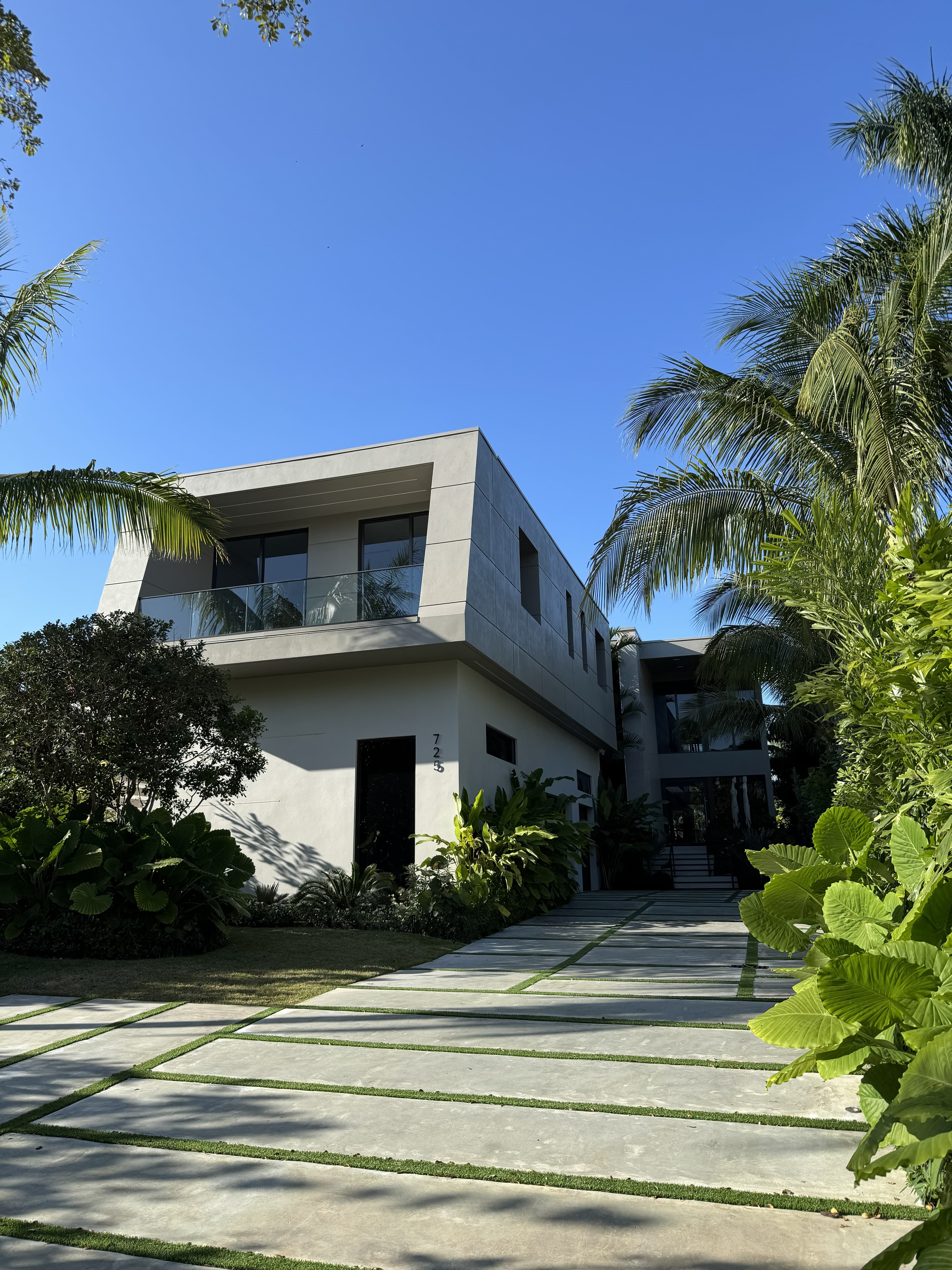 Exterior of a modern two-story home with completed landscaping